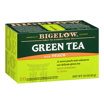 Bigelow Peach Green Tea box with vibrant peach coloring and green tea branding, 20 individually wrapped tea bags on white background.