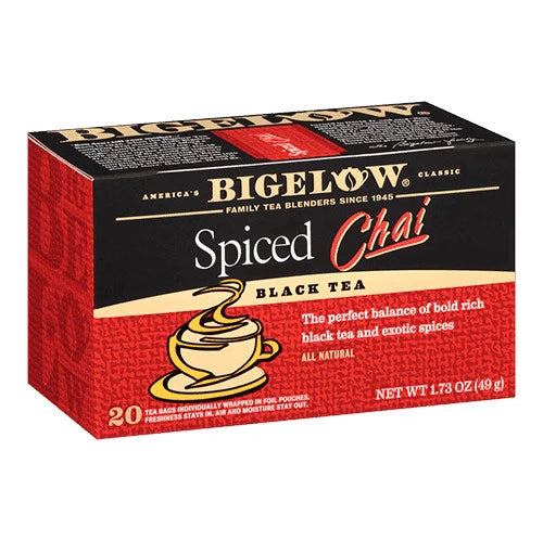 Bigelow Spiced Chai black tea box with warm spice-inspired colors and 20 individually wrapped tea bags displayed on white background.